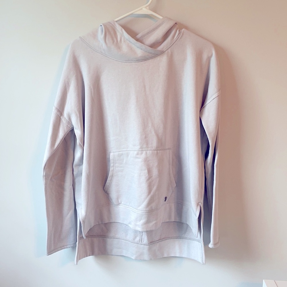 Light grey hoodie.